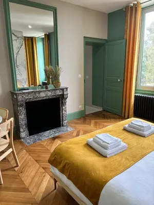 Un ou plusieurs lits dans un hébergement de l'établissement La Parenthèse Fléchoise, Chambre Armand