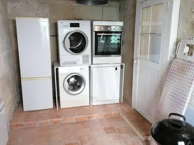 Cuisine ou kitchenette dans l'établissement CHEZ LOLO Maison chaleureuse avec cheminée