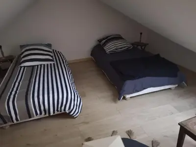 Un ou plusieurs lits dans un hébergement de l'établissement Le petit Plessis studio