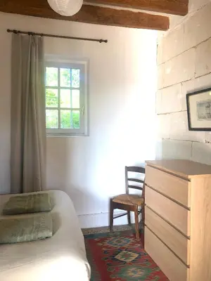 Un ou plusieurs lits dans un hébergement de l'établissement Le charme de l'ancien au calme et à 8 min de Chenonceaux
