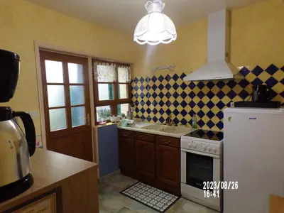Cuisine ou kitchenette dans l'établissement Le Chandelier