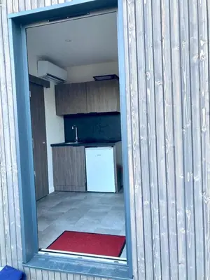 Cuisine ou kitchenette dans l'établissement Studio atypique Le Mans