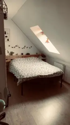Un ou plusieurs lits dans un hébergement de l'établissement Maison La Suze