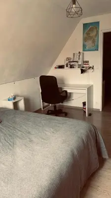 Un ou plusieurs lits dans un hébergement de l'établissement Maison La Suze