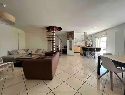 Coin salon dans l'établissement Maison de vacances