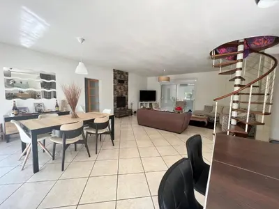 Coin salon dans l'établissement Maison de vacances