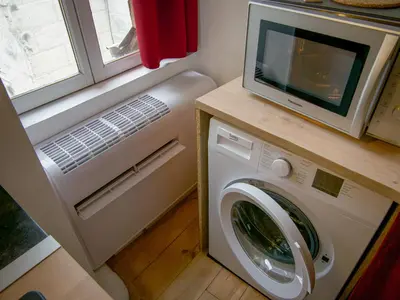 Cuisine ou kitchenette dans l'établissement La tanière du sorcier