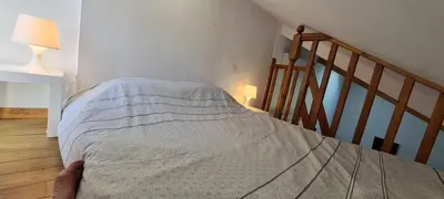 Un ou plusieurs lits dans un hébergement de l'établissement Gîte Coco Studio à 20 km de Saumur
