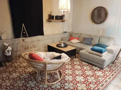 Coin salon dans l'établissement D'une rive à l'autre