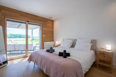 Un ou plusieurs lits dans un hébergement de l'établissement GreenWoods Ecolodge - Zoo de Beauval et Châteaux de la Loire
