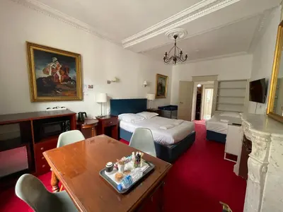 Un ou plusieurs lits dans un hébergement de l'établissement Les Chambres Panda