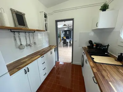 Cuisine ou kitchenette dans l'établissement Domaine entier Le Clos des Trois Provinces 20 personnes Zoo Beauval