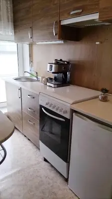Cuisine ou kitchenette dans l'établissement Appartement à côté de port