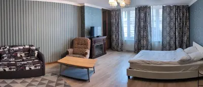 Coin salon dans l'établissement Appartement à côté de port