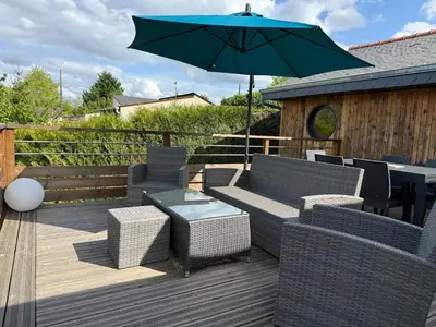 Balcon ou terrasse dans l'établissement Chalet cosy à La Flèche avec terrasse et vue rivière - FR-1-410-424