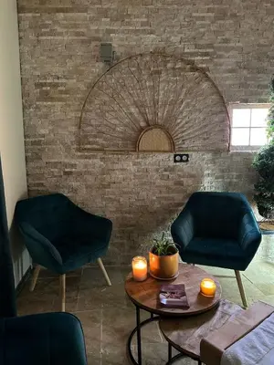 Coin salon dans l'établissement Gîte La Capucine