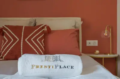 Un ou plusieurs lits dans un hébergement de l'établissement Le Presti-Twin - PrestiPlace Collection