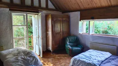 Coin salon dans l'établissement Petit Moulin Renaissance