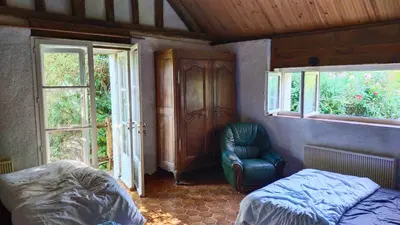 Coin salon dans l'établissement Petit Moulin Renaissance