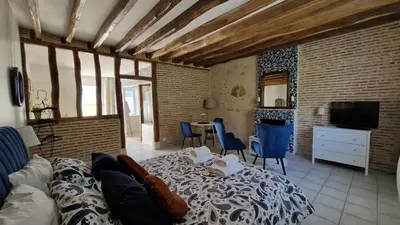 Télévision ou salle de divertissement dans l'établissement La Maison Pas'Chaaxe