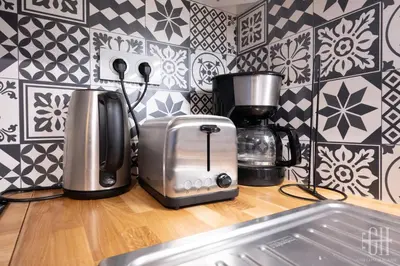 Cuisine ou kitchenette dans l'établissement Le Fidji / 100m Gare