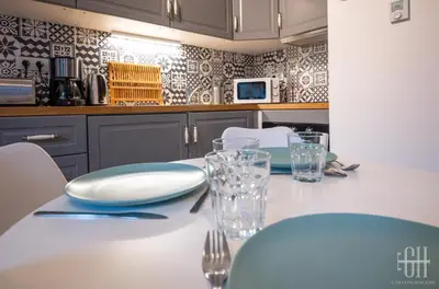 Cuisine ou kitchenette dans l'établissement Le Lagon / 100m Gare