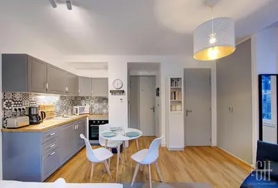Cuisine ou kitchenette dans l'établissement Le Lagon / 100m Gare
