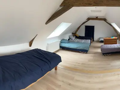 Un ou plusieurs lits dans un hébergement de l'établissement Maison spacieuse près du Mans et Tours, idéale pour famille, avec terrasse, jardin et parking - FR-1-410-425