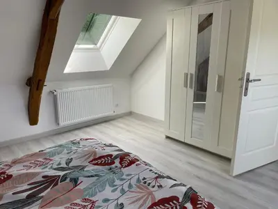 Un ou plusieurs lits dans un hébergement de l'établissement Maison spacieuse près du Mans et Tours, idéale pour famille, avec terrasse, jardin et parking - FR-1-410-425