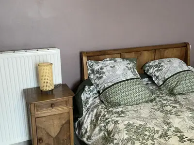 Un ou plusieurs lits dans un hébergement de l'établissement Maison spacieuse près du Mans et Tours, idéale pour famille, avec terrasse, jardin et parking - FR-1-410-425