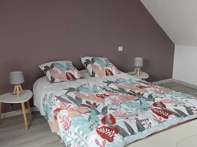 Un ou plusieurs lits dans un hébergement de l'établissement Maison spacieuse près du Mans et Tours, idéale pour famille, avec terrasse, jardin et parking - FR-1-410-425