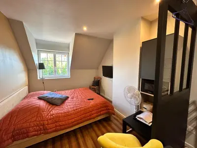 Un ou plusieurs lits dans un hébergement de l'établissement Chambre chez Alain et Armelle