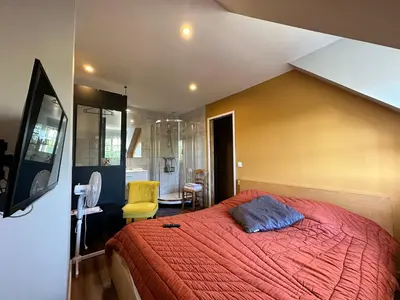 Un ou plusieurs lits dans un hébergement de l'établissement Chambre chez Alain et Armelle