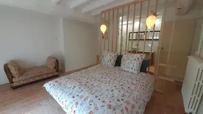Un ou plusieurs lits dans un hébergement de l'établissement Château de Briançon, The Originals Relais