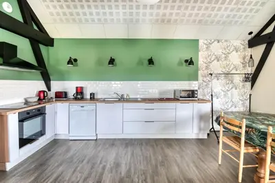 Cuisine ou kitchenette dans l'établissement Gîte Ruelle aux Vaches - Avec piscine partagée
