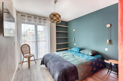 Un ou plusieurs lits dans un hébergement de l'établissement Gîte du Thouet - Appt avec piscine partagée