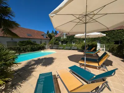 Piscine de l'établissement Domaine de Champouteau - Gîtes et Chambres d'hôtes ou située à proximité
