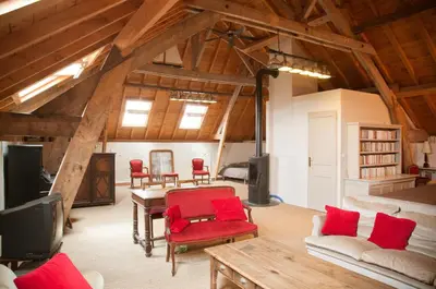 Coin salon dans l'établissement Chambre d'Hôtes des Grands Moulins de Baugé