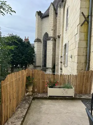 Jardin de l'établissement Le Jeanne, appartement en duplex proche forteresse et centre ville