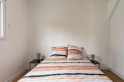 Un ou plusieurs lits dans un hébergement de l'établissement Les Chalets du Mancel - Chalet Vakiry - 500 m Bouleries Jump , 10 min du circuit des 24h