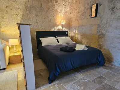 Un ou plusieurs lits dans un hébergement de l'établissement Charmante maison troglodyte Loire Valley