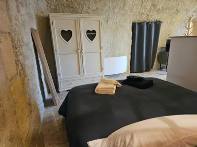 Un ou plusieurs lits dans un hébergement de l'établissement Charmante maison troglodyte Loire Valley
