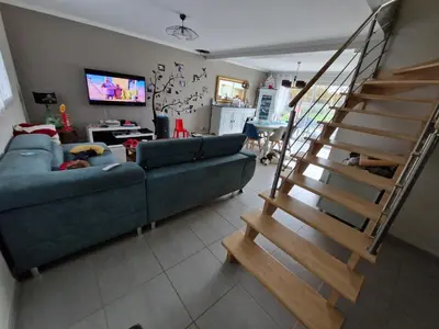 Télévision ou salle de divertissement dans l'établissement Chambres Logement 130m2 - Circuit 24h Le Mans