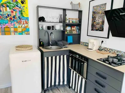 Cuisine ou kitchenette dans l'établissement L’Appar(T) du Grand Bois - Jacuzzi -