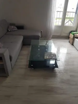 Coin salon dans l'établissement chambre neuve dans un logement partager a 10 minute du circuit