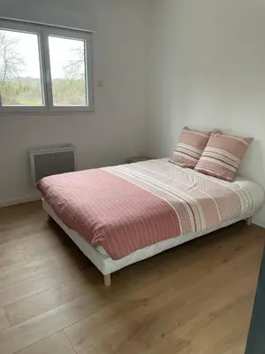 Un ou plusieurs lits dans un hébergement de l'établissement Les Chalets du Mancel - Chalet Victor - 500 m Bouleries Jump , 10 min du circuit des 24h