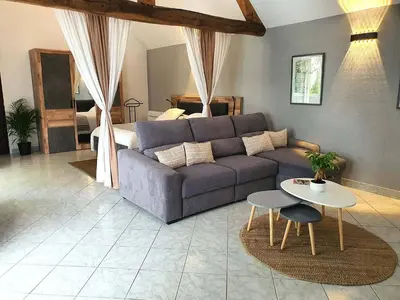 Coin salon dans l'établissement La Chambre des Châteaux