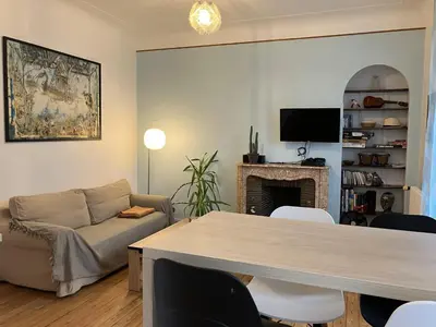 Télévision ou salle de divertissement dans l'établissement Appartement proche centre/gare