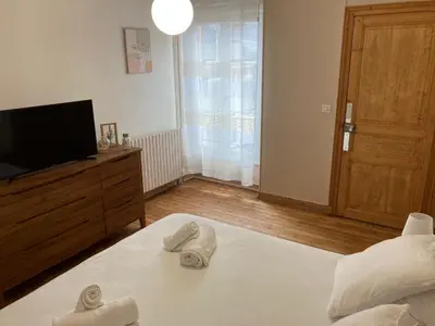 Un ou plusieurs lits dans un hébergement de l'établissement Appartement proche centre/gare
