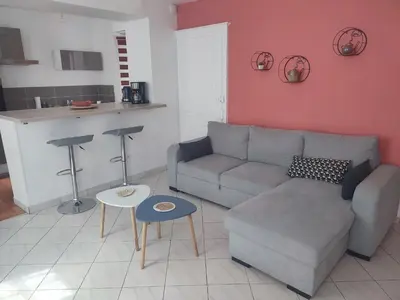 Coin salon dans l'établissement Appart chaleureux avec terrasse